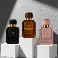 Flacon de parfum de luxe personnalisé 30ml 50ml 100ml en verre rose et noir avec collier doré et capuchon métallique, atomiseur vide élégant pour marque