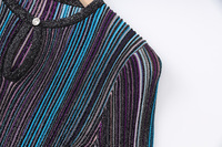 Nouvelle collection Printemps 2026 : Ensemble décontracté pour femme en tricot avec fil doré et argenté, comprenant un pull et une jupe midi en maille, idéal pour les fêtes.