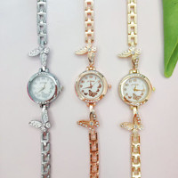Nouvelle montre-bracelet en alliage papillon, fabrication exquise, compacte, best-seller, quartz créatif, plusieurs fuseaux horaires