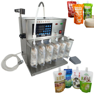 Petite machine de remplissage semi-automatique pour sachets à bec verseur, idéale pour la production de mini-emballages liquides en usine domestique - Product Image 1