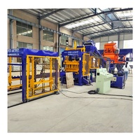 Chaîne de production complète et entièrement automatique de machines à fabriquer des briques creuses en ciment QT6-15, des pavés et des blocs de béton solides pour usine