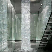 Lustre en cristal en cascade à colonnes rondes, luminaire suspendu vertical personnalisé pour hall d'hôtel, villa, plafond haut, escalier