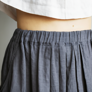 กระโปรงผ้าลินินหลวมที่มีแถบยืดหยุ่นและกระเป๋า - Product Image 1