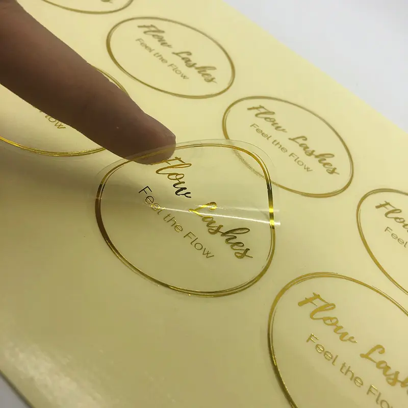 Stiker Foil emas hitam label kustom transparan pencetakan profesional bahan kemasan PVC tahan air OEM stiker perekat