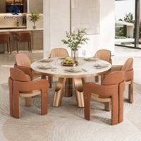 Table de salle à manger ronde de luxe pour projet hôtelier, plateau en pierre frittée de 12 mm, base en or rose brossé, mobilier commercial pour restaurant