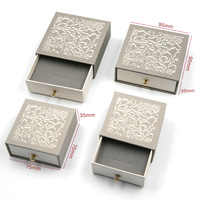Boîte à bijoux de luxe, boîte à tiroir, boucle dorée, motif de logo en relief, boîte en carton pour bagues, boucles d'oreilles, collier, cadeau
