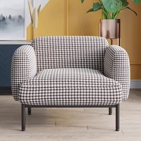Fauteuil de salon simple à motif pied-de-poule, design unique, avec dossier et accoudoirs, idéal pour salon de manucure ou détente