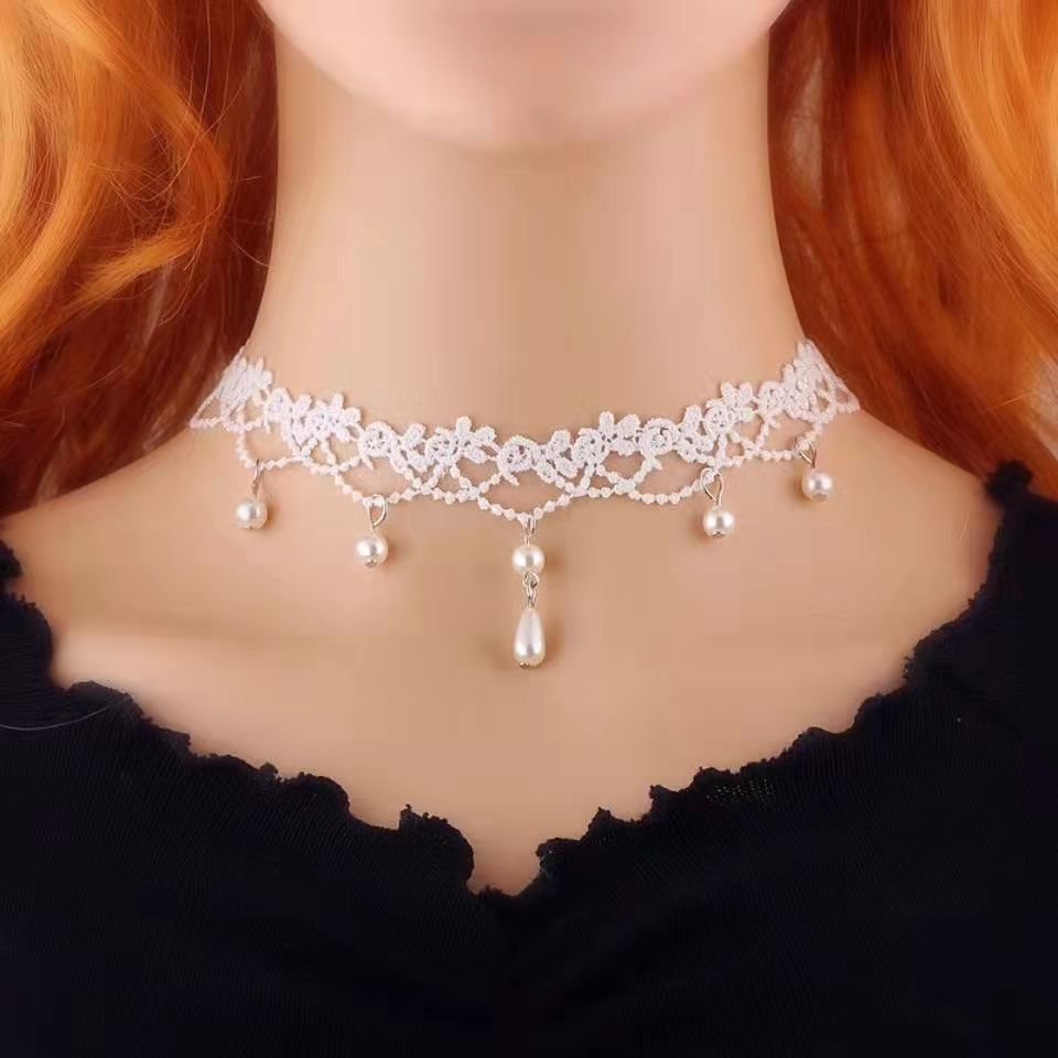 Three flowers hanging with white pearls