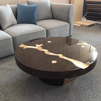 Table basse ronde en bois massif craquelé, style moderne et luxueux, pour salon de villa de luxe