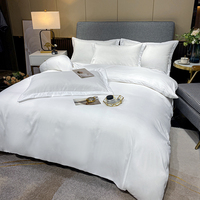 Les textiles d'hôtel sont luxueux et doux, un ensemble de literie 4 pièces adapté à l'utilisation hôtelière