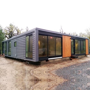 Maisons résidentielles préfabriquées en conteneurs maritimes 40 HQ avec murs en verre, 2 chambres, cuisine et salle de bain à vendre 01 Préfabriquées - Product Image 1
