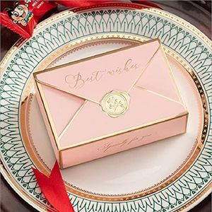Boîte rigide rose avec motif de vœux en feuille d'or et sceau de cire pour emballage cadeau - Product Image 1