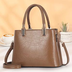Nouvelle tendance en gros de luxe en cuir PU femme sacs à <span class=keywords><strong>main</strong></span> dames couleur unie <span class=keywords><strong>sac</strong></span> à <span class=keywords><strong>main</strong></span> gland femmes sacs à <span class=keywords><strong>main</strong></span> - Product Image 1