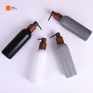 Grand distributeur de liquide de lotion personnalisé avec pompe en bois Accessoires de salle de bain en polyrésine noire pour ensembles de salle de bain d'hôtel