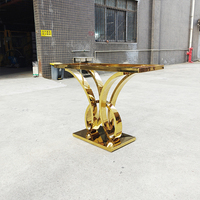 Table de salle à manger extérieure de luxe moderne en forme de papillon en acier inoxydable et verre trempé, durable pour hôtels et mariages