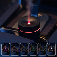 Flamme Coloré Atmosphère Lumière Parfum Électronique Logo Monté Huile Essentielle Mini Noir Diffuseur D'air De Voiture Humidificateur
