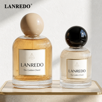 Flacon de parfum cylindrique de luxe vide en verre côtelé personnalisé de 30 ml, 50 ml, 100 ml avec grand capuchon sphérique
