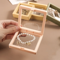 Boîte de présentation flottante de luxe haut de gamme en PE, boîte à film transparent pour emballage de bracelets, colliers et pierres précieuses