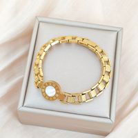 Bracelet en acier inoxydable étanche, à chiffres romains, tendance et très vendu à l'international, pour couples en Europe et en Amérique.