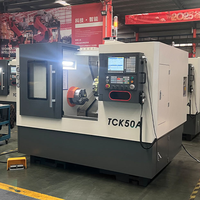 Mesin Bubut CNC TCK50A Tipe Slant Bed dengan Lubang Spindle 66mm, Turret Hidrolik 8 Stasiun, Swing 500mm, 3000 RPM untuk Fitting