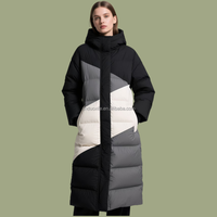 Vestes matelassées OEM personnalisées en duvet de canard blanc à 90 %, manteaux pour femmes à capuche avec décor rayé, style sportif, longs et amples, pour l'hiver