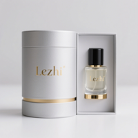 Boîte rigide de luxe personnalisée pour parfum avec logo estampé or, emballage de parfum indépendant en forme de baril rond mat avec EVA