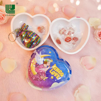Fournisseur direct d'usine, vente en gros OEM, chocolat en forme de cœur personnalisable, bonbons, jouets, œufs, collation préférée des enfants, Chaoan