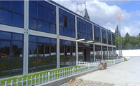 Maison conteneur modulaire détachable économique préfabriquée en kit avec mur rideau en verre, 2 étages, pour bureau, hôtel, école