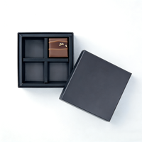 Boîte à chocolat noire de luxe personnalisée avec revêtement doux au toucher, laminage mat, séparateur rigide, aimant décoratif en carton