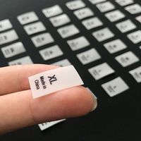 Étiquettes de taille de vêtements en caoutchouc de silicone de haute qualité Logo 3D épais imprimé accessoires de vêtements lavables