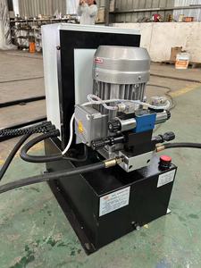 Equipo de volteo industrial de servicio pesado personalizado para manipulación de materiales - Máquina elevadora con accionamiento eléctrico hidráulico - Product Image 1