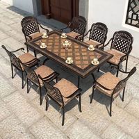 Table d'extérieur Chaise Cour Villa en plein air Cour Imperméable Terrasse Fonte d'aluminium Carreau de céramique Longue Chaise de bureau Combinaison
