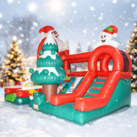 Château gonflable commercial de Noël avec toboggan pour enfants, idéal pour les fêtes de Noël et les attractions commerciales