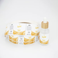 Rouleau d'étiquettes transparentes brillantes en PVC durable, personnalisées, avec logo imprimé sur mesure, imperméables et autocollantes, vente en gros