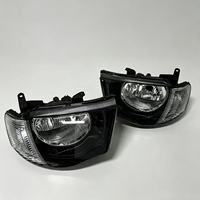 Ensemble de phares avant halogènes, ajustement OE, lentille transparente blanche, vente directe d'usine pour Mitsubishi L200 05