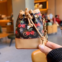 Nouvelle mini sacoche seau haut de gamme en PU, porte-monnaie tendance en cuir PU, étui de rangement pour écouteurs, porte-monnaie imprimé avec porte-clés