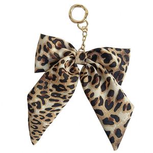 Autumn and Winter Leopard Print Bow Keychain Korean Style Fabric & Metal Ribbon Bag Pendant Creative <b>Car</b> - Product Image 5