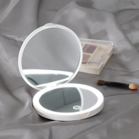 Miroir cosmétique à marque privée, fabrication sur mesure, logo personnalisé, LED portable, miroir de maquillage pliable à double face, grossissant, à intensité variable