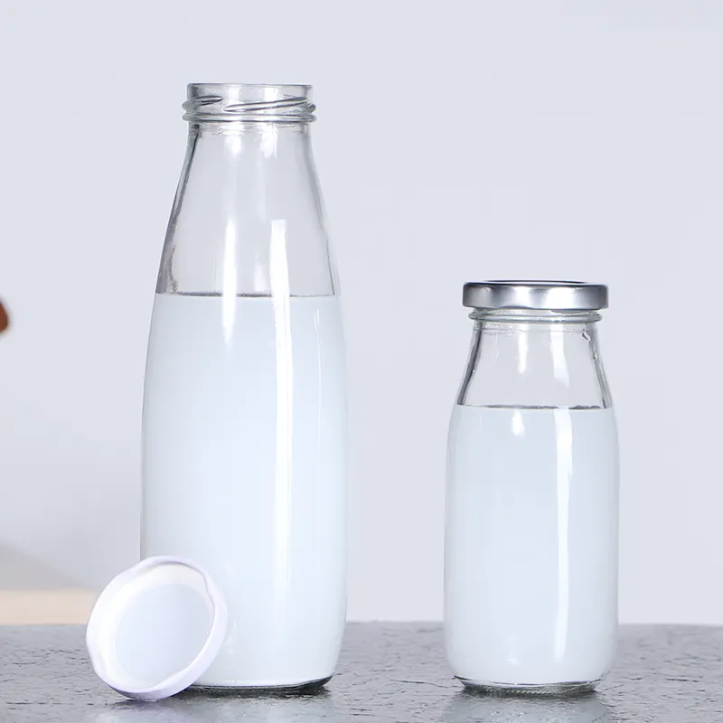Groothandel Food Grade Verpakking Cilinder Schroef Top Lege Heldere Melk Glazen Fles Met Metalen Deksel