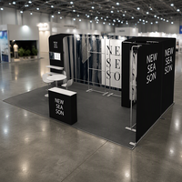 Stand d'exposition modulaire 10x20 pieds en aluminium à montage rapide sans outils, avec cadre en tissu et espace de rangement pour l'exposition de vêtements