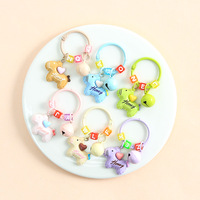 Nouveau porte-clés pendentif poney de dessin animé, breloque clochette colorée, accessoire créatif polyvalent, décoration suspendue en résine plastique, hiver