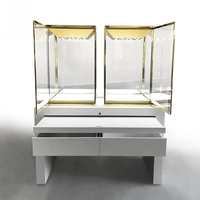Îlot de présentation de bijoux LED de luxe avec design transparent intégré au milieu de l'îlot, écologique et durable, dimensions personnalisables