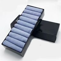 Vente en gros Coffret cadeau avec emballage Chaussettes d'affaires noires en coton avec motif design classique personnalisé pour hommes