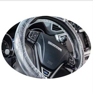 Couvercle de <span class=keywords><strong>volant</strong></span> <span class=keywords><strong>jetable</strong></span> en <span class=keywords><strong>plastique</strong></span> extensible, 100 pièces, protecteur pour voiture - Product Image 4