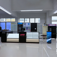 Présentoir de sol personnalisé APEX pour magasin de tabac avec grand écran vidéo et système de poussée en nid d'abeille, mobilier de présentation pour magasin de tabac