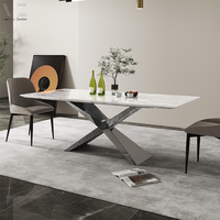 Meubles de salon italiens modernes de luxe en acier inoxydable personnalisés Esszimmertisch Table de salle à manger en marbre de pierre frittée