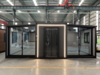 Maison préfabriquée extensible de 20 pieds, 38 m², avec mur-rideau en verre et éclairage d'ambiance intégré pour pièce de jardin