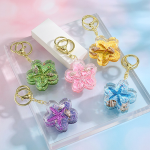 Llavero de acrílico con diseño de dibujos animados de Quicksand, colgante de bolsa con flor de cerezo, bonito llavero de pareja, regalo de Sakura con líquido flotante - Product Image 4