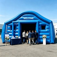 Grande tente publicitaire gonflable en PVC à structure arquée avec intérieur spacieux pour événements marketing et activités de marque