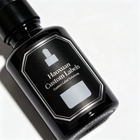 Étiquettes autocollantes en PET noir avec gaufrage argenté pour flacons compte-gouttes d'huile pour le visage Haoxuan OEM, pour emballages cosmétiques